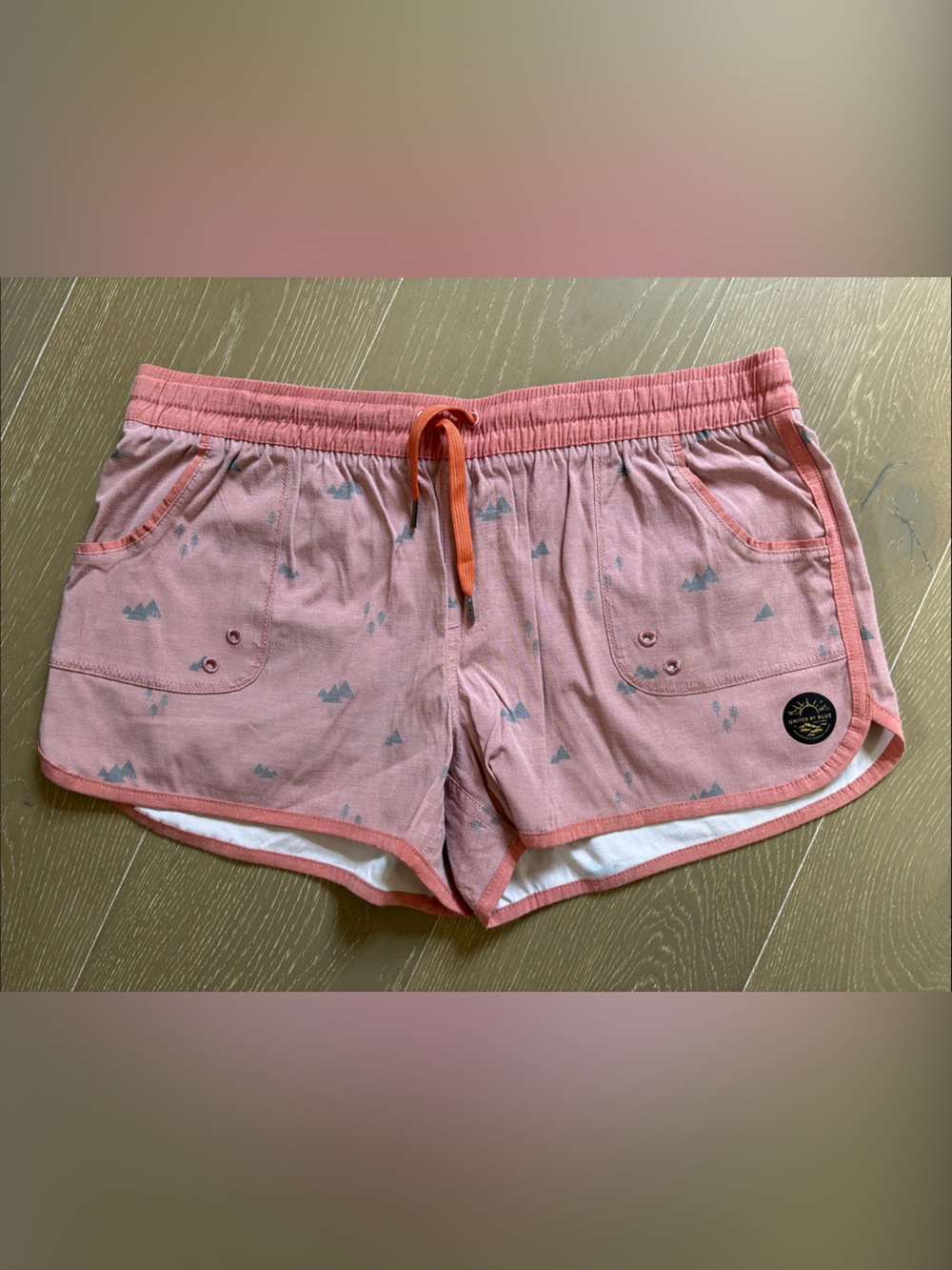United By Blue Pink Coral Shorts with Gray Mountains and Trees Print